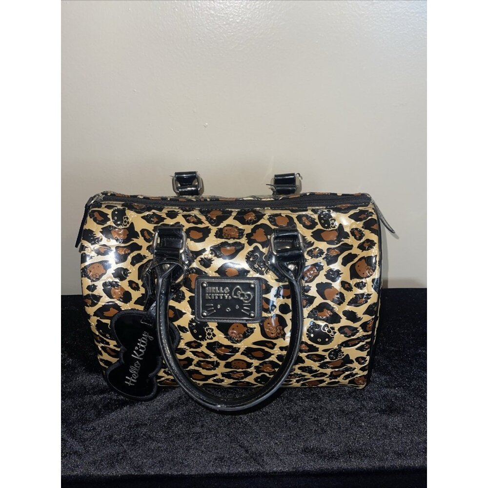 Hello Kitty Leopard Print Handbag With Black Hand… - image 1